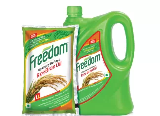 Why a Simple Switch to Rice Bran Oil is Transforming Health in Indian Kitchens Healthy cooking with Rice Bran Oil in an Indian kitchen.