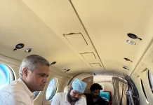 Historic ECMO Airlift Saves 8-Year-Old Boy’s Life A specialized medical team monitoring a critically ill pediatric patient connected to ECMO life-support equipment inside an air ambulance.